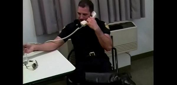  Manly cop fucks a horny gay stud in his office